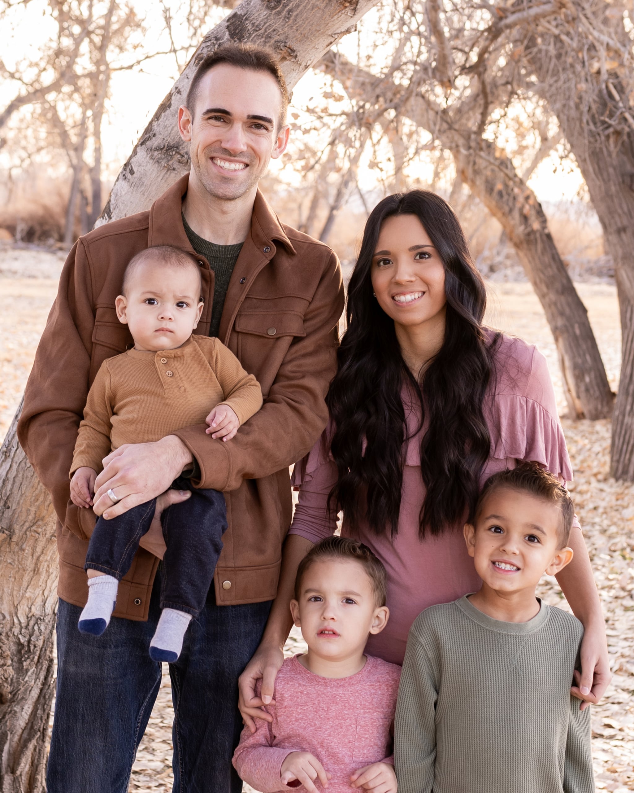 Dr. Beckstrand with his wife and three children outdoors