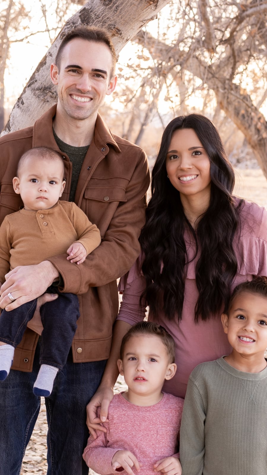 Dr. Beckstrand with his wife and three children outdoors