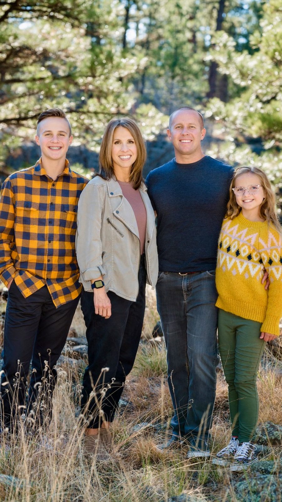 Dr. Eric Peterson with his family outdoors